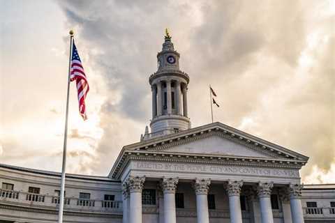 Hundreds of people ride bicycles and then lay in front of the Denver city and county buildings to die from fatal bicycle accidents