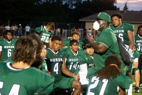 Huron football unsatisfied after historic victory over Monroe