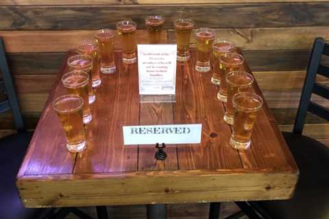 Virginia Taphouse reserves table in honor of killed troops