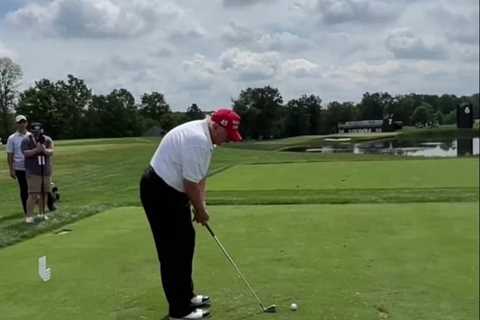 Donald Trump is harassed by banter at his own golf course after sending a shot into the water