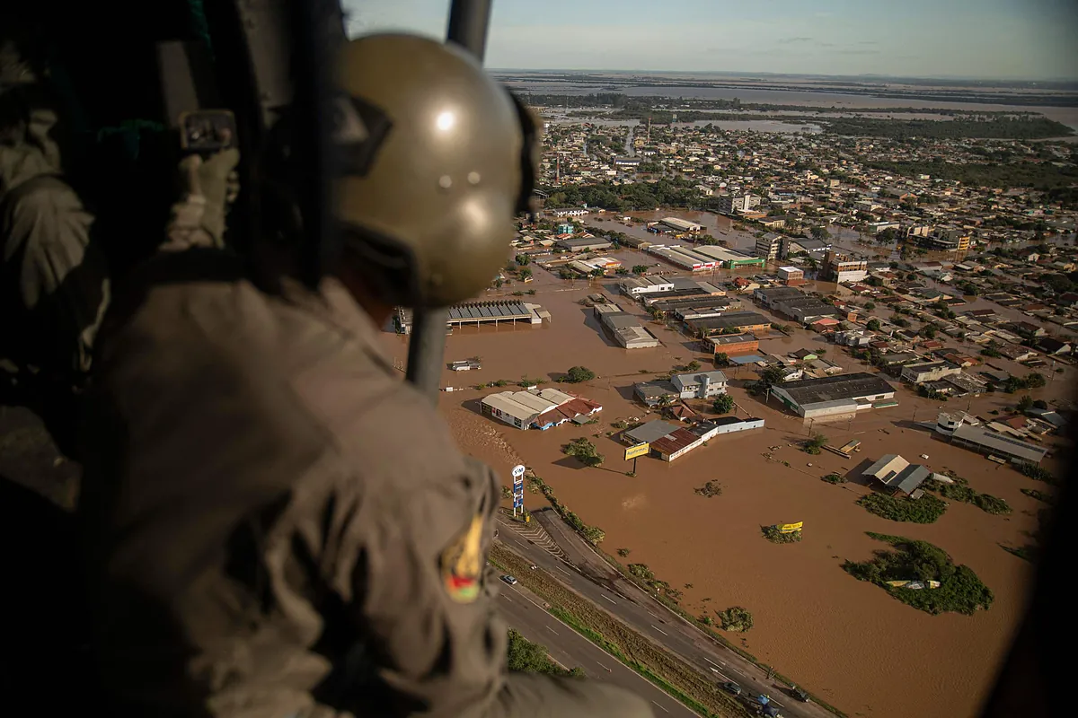 at least 100 dead in southern Brazil under water – •